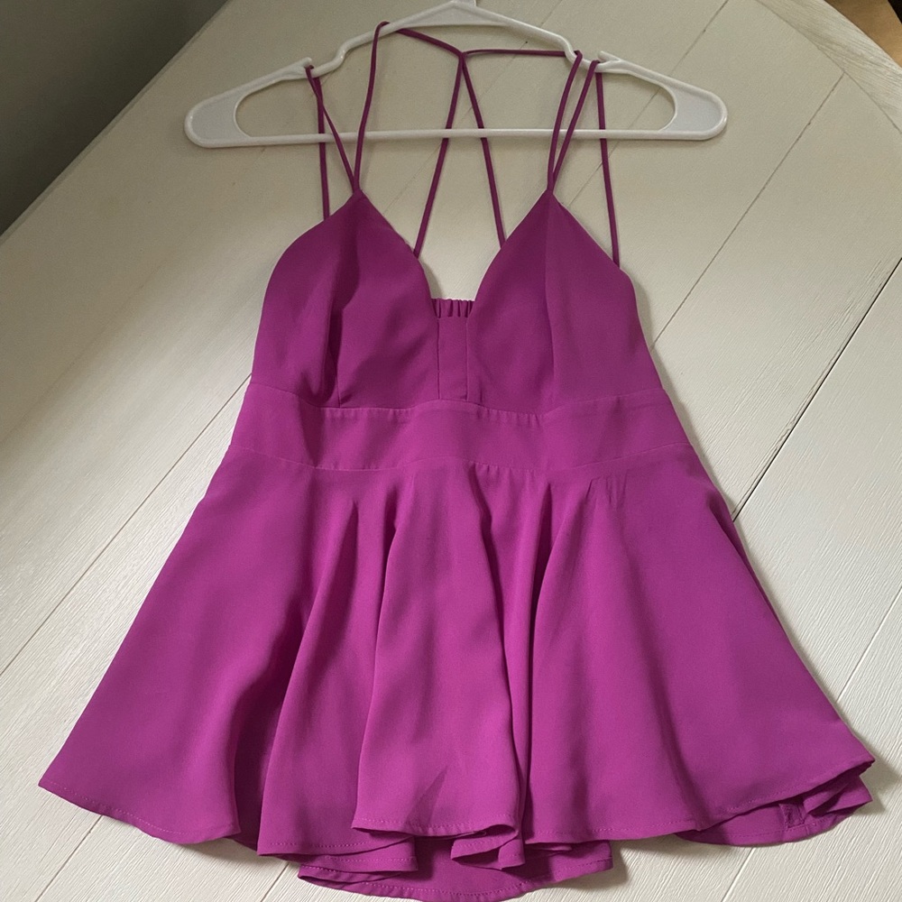Express peplum top with back detail. Size small